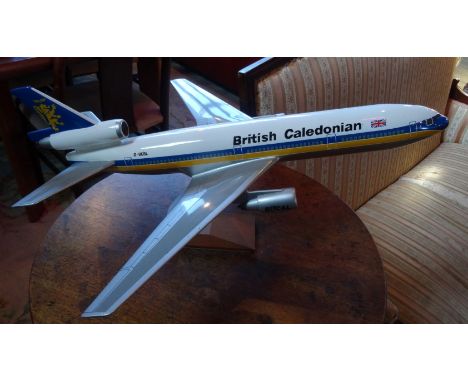 A scale model of a British Caledonian aircraft on display stand, manufactured by Executive Display Models, 54cm.