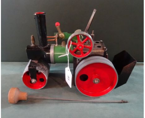 A Mamod steam engine, green painted body with red wheels and roller, unboxed.