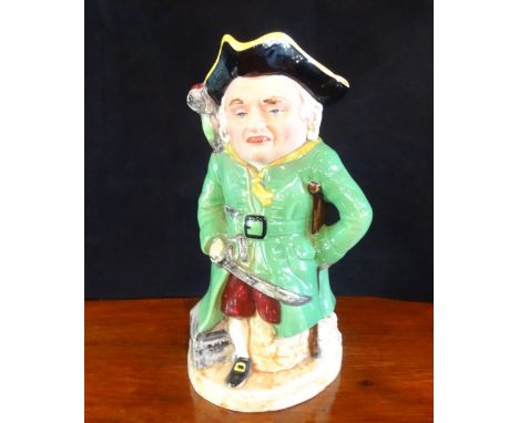 A ceramic Toby musical jug modelled as Long John Silver (27cm).