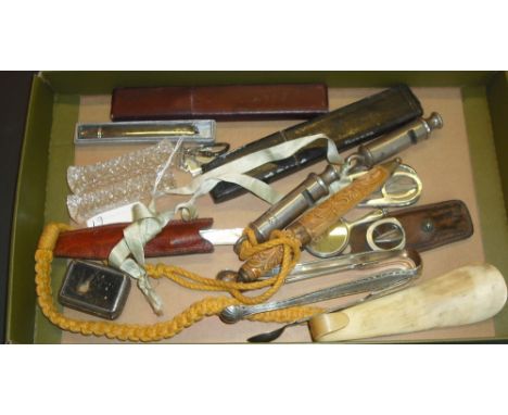 A collector's lot, to include: two police whistles, a bone shoe horn, a silver cased pair of folding scissors, a miniature si