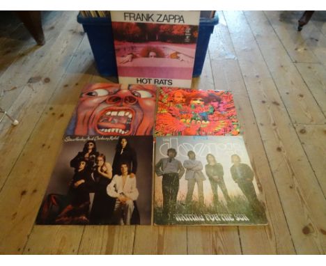 A box containing approximately 80 LP's and other records, to include: Frank Zappa, Hawkwind, The Pretty Things, Bob Dylan, Th