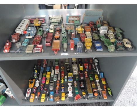 Two shelves of mixed vintage mainly playworn diecasts including Dinky, Corgi, Matchbox erc, approx 100+