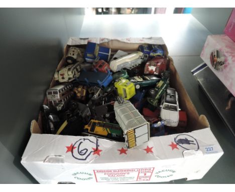A box of playworn diecasts including Budgie, Dinky, Corgi etc
