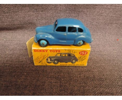 A Dinky diecast, 152 Austin Devon, Dark Blue with light blue hubs in original box, missing flaps