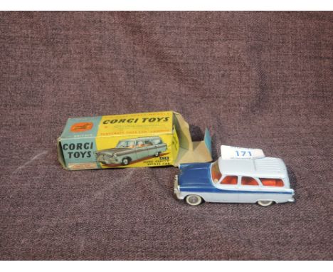 A Corgi diecast, 424 Ford Zephyr Estate Car in two tone blue with red interior, in original box