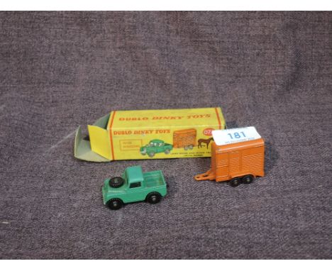 A Dublo Dinky diecast, 073 Land Rover and Horse Trailer with Horse, green land rover, orange trailer and light brown plastic 