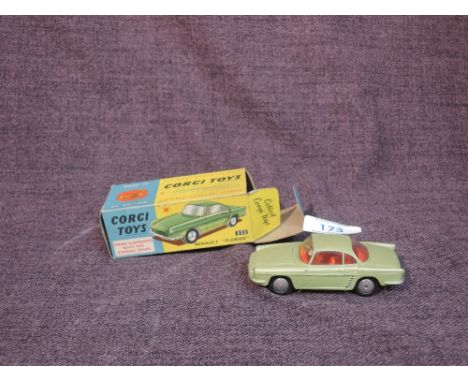 A Corgi diecast, 222 Renault Floride in metallic green with red interior, in original box