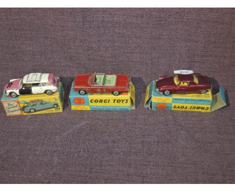 Three Corgi diecasts, 259 Le Dandy Coupe in metallic maroon with yellow interior (af), 475 Citroen Safari being repainted and