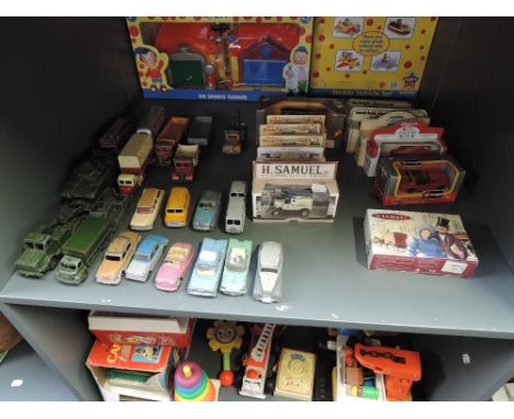 A shelf of mixed vintage diecasts including playworn Dinky &amp; Corgi including Military, Wagons and Cars, later boxed Lledo