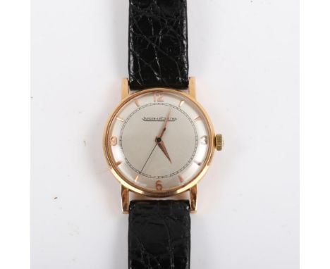 JAEGER LECOULTRE - a Vintage 18ct gold mechanical wristwatch, circa 1950s, silvered dial with quarterly Arabic numerals, cali