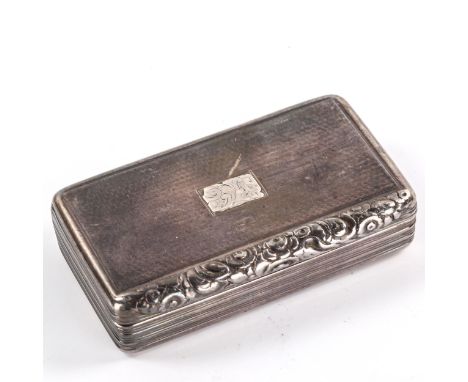 A George II silver snuffbox, plain rectangular form with engine turned decoration and cast floral thumb-piece with reeded sid