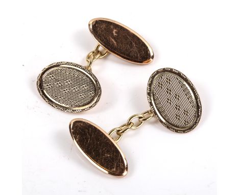 A pair of early 20th century 9ct gold oval panel cufflinks, engine turned decoration, hallmarks Birmingham 1926, panel length