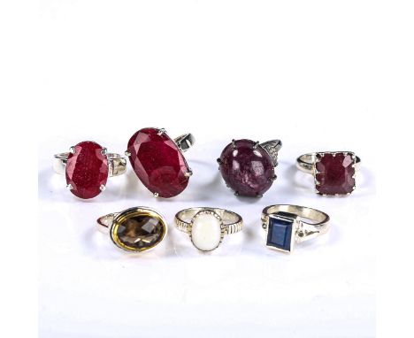 Various modern silver gem set rings, gem stones include cabochon ruby, rectangular step-cut sapphire, rose-cut smoky quartz, 