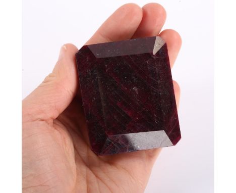 994ct unmounted rectangular step cut ruby, dimensions 57.00 x 48.00 x 29.22mm, 199.22g, with GLI Gemstome Report CardNo damag