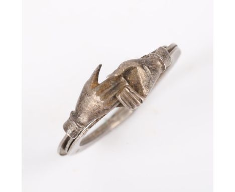 A Victorian silver Fede Gimmel ring, triple swivel band with two clasped hands opening to reveal a heart, unmarked settings t