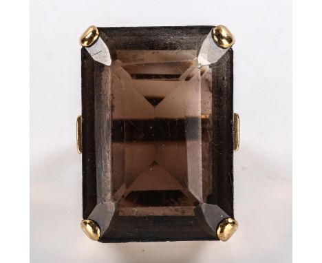 A large mid-20th century 9ct gold smoky quartz dress ring, set with emerald step-cut quartz, hallmarks London 1965, quartz le