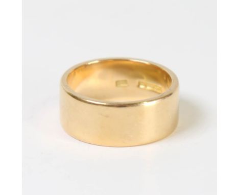 A heavy Antique 18ct gold wedding band ring, maker's marks SE, hallmarks Birmingham 1914, band width 9.6mm, size approx W, 17