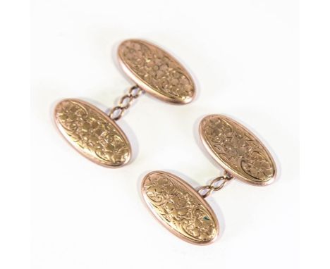 A pair of early 20th century 9ct rose gold cufflinks, oval floral engraved panels, hallmarks Birmingham 1911, panel length 22