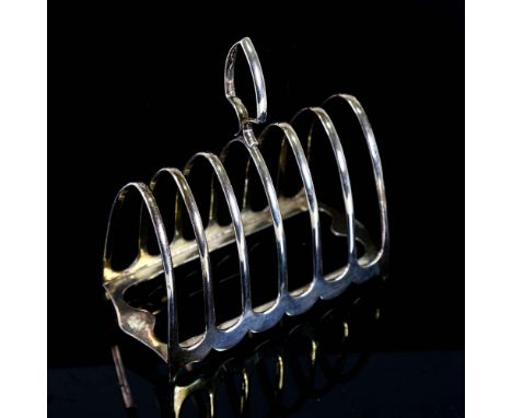 A large George V silver 7-bar toast rack, by Walker & Hall, hallmarks Sheffield 1913, length 17cm, height 17.5cm, 11.6ozNo da