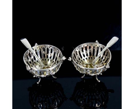 A pair of German Hanau? silver bon bon baskets, import mark of John George Piddington, hallmarks London 1901, diameter 8.5cm,