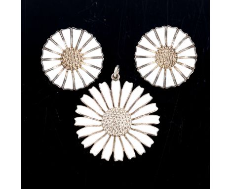 ANTON MICHELSEN - a Danish vermeil sterling silver and white enamel daisy pattern matching pendant and pair of clip-on earrin