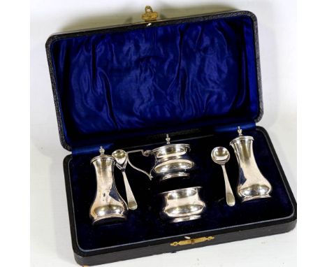 A George V silver 4-piece cruet set, baluster form with blue glass liners, by F H Adams & Co, hallmarks Birmingham 1925, pepp