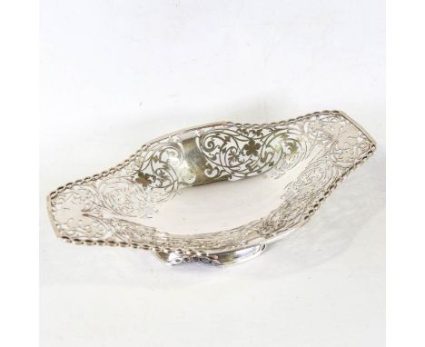 A George VI silver pedestal cake basket, oval form with pierced foliate decoration, by Viner's Ltd, hallmarks Sheffield 1939,