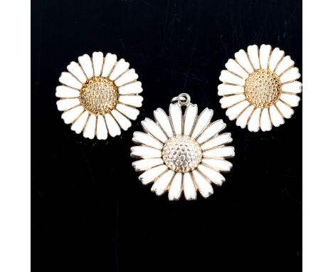 VIGGO PEDERSEN - a Danish vermeil sterling silver and white enamel daisy pattern pendant, and BENT GABRIELSEN - a similar pai