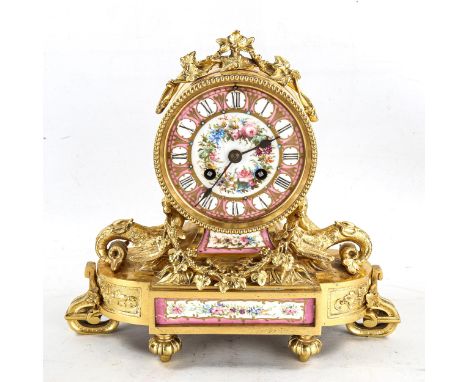 A 19th century French ormolu drum-cased 8-day mantel clock, hand painted floral pink enamel dial, with dragon supports and ha