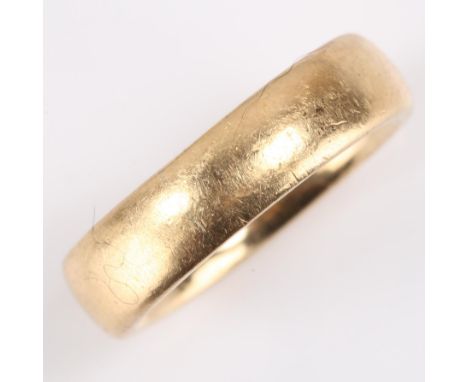 A heavy late 20th century 9ct gold wedding band ring, maker's marks H-L, hallmarks Birmingham 1989, band width 5.7mm, size P,