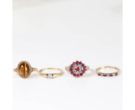 4 x 9ct gold stone set rings, gemstones include diamond, ruby and tiger's eye, sizes O, Q x 2 and R, 11.2g total (4)No damage