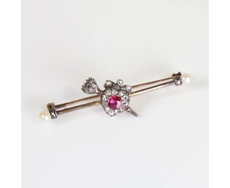 A Victorian ruby diamond and pearl heart and arrow sentiment bar brooch, unmarked gold set with old European cut ruby and ros