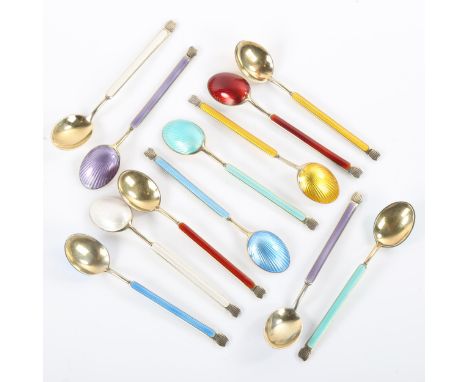 ANTON MICHELSEN - a set of 12 Danish vermeil sterling silver and harlequin enamel coffee spoons, spoon length 10cm1 of each t