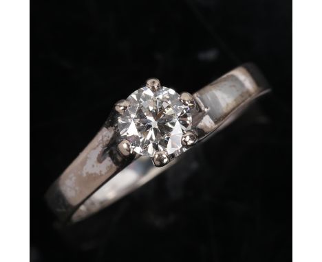 A Japanese white gold 0.55ct solitaire diamond ring, twisted 6-claw setting with modern round brilliant cut diamond, colour a