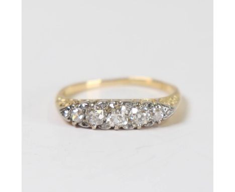 A Victorian 18ct gold graduated 5-stone diamond half hoop ring, set with old cut diamonds and rose cut diamond accents, engra