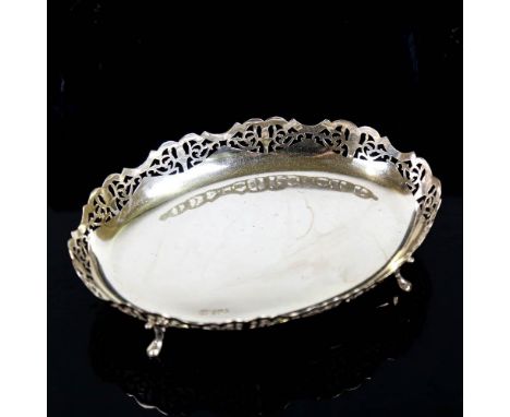 A George VI silver dessert dish, oval form with pierced gallery raised on four feet, by Viner's Ltd, hallmarks Sheffield 1945