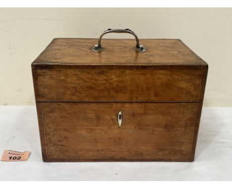 A George IV satinwood tea caddy, with tulipwood banding and boxwood stringing, the lid with hallmarked silver handle. 8½' wid