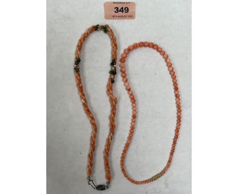 A necklace of graduated coral beads and a necklace of rope-twist coral and jade beads