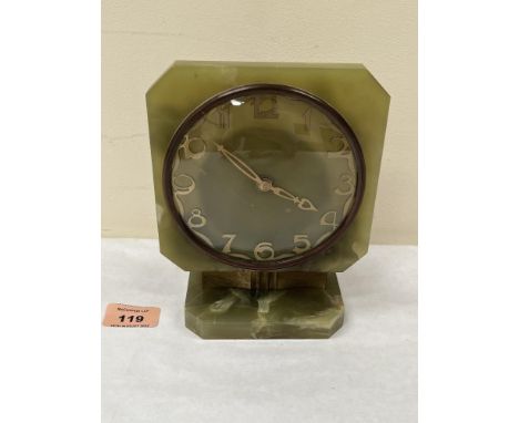 A mid-20th century onyx mantle clock in Art-Deco style by The Onyx Art Company, Scotland. 7' high. In working order