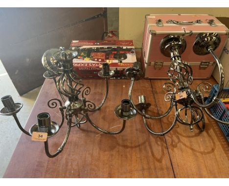 A pair of five light hanging lamps