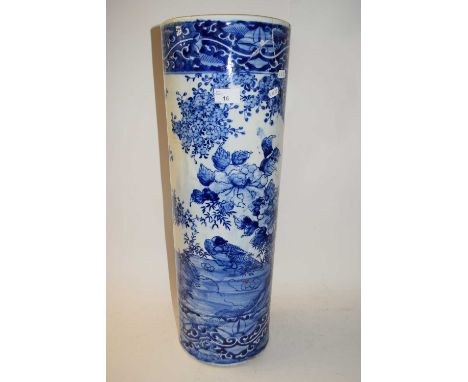 19th CENTURY CHINESE LARGE BLUE AND WHITE CYLINDRICAL FORMED STICK STAND DECORATED WITH FLORAL DESIGN, HEAVILY DAMAGED AND RE