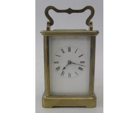 An English Brass Carriage Clock, 16cm to top of handle, running 