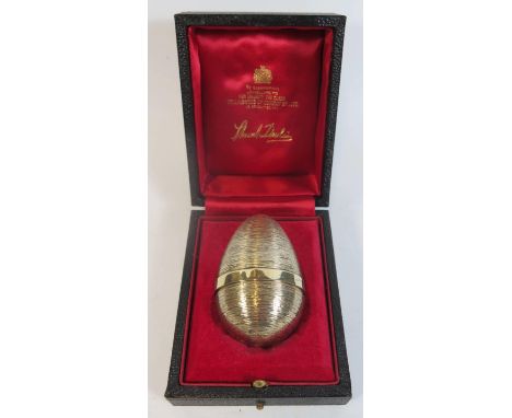 A Stuart Devlin Silver Gilt Egg, opening to reveal an Easter chick, London 1971, 162g, in original presentation box 