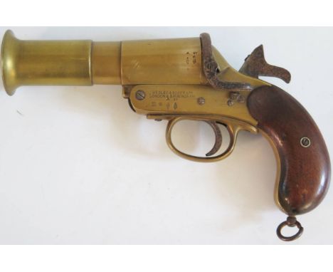 A WWI Webley &amp; Scott Flare Gun, crows foot mark and dated 17, ID no. 64294. The firing pin has been filed, but this requi