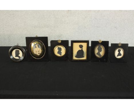 Six framed and glazed 19th century shadow portraits and one print of a lady in best dress.  H.15 W.14cm. (largest) 