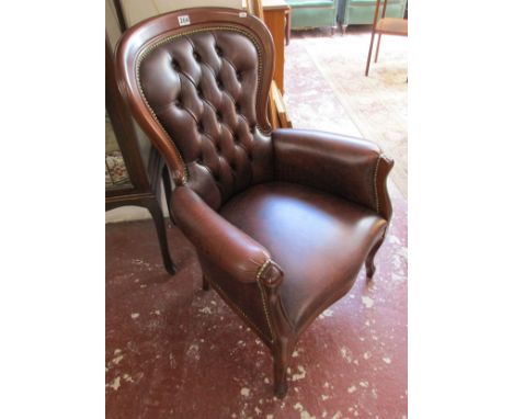 Leather button-back armchair