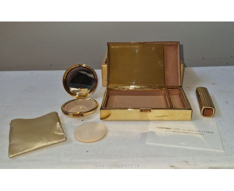 Tom Ford for Estee Lauder: a brand new and unused ‘Minaudiere gold’ compact and lipstick set with flip down mirror; boxed and