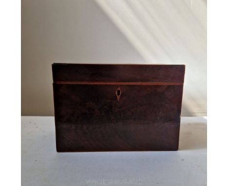 A George III flame Mahogany two compartment tea caddy, with internal covers (the tiny handles certainly bone), some stringing