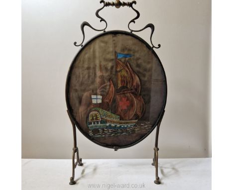A most unusual late 19th century art nouveau brass Firescreen mounted under glass with a watercolour picture of Columbus's fl