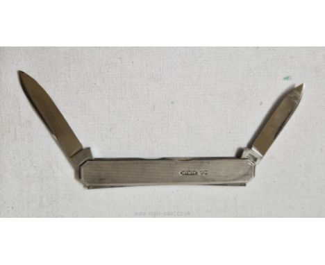 A fine Herbert Slater silver cased double bladed pen knife, the engine turned case marked HMS and Sheffield for 1949, the sta